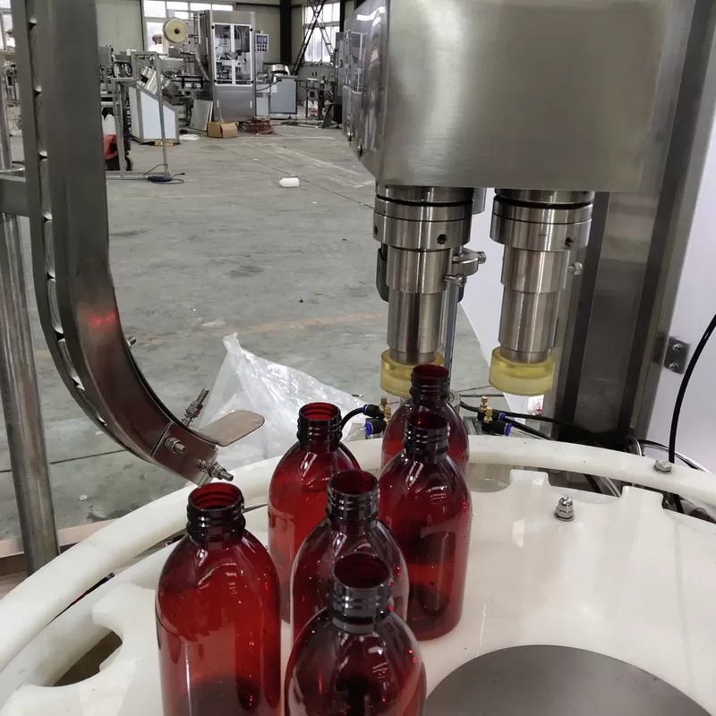 Máquina de recheo de botellas de aceite esencial de 3 KW con dispositivo anti aspiración